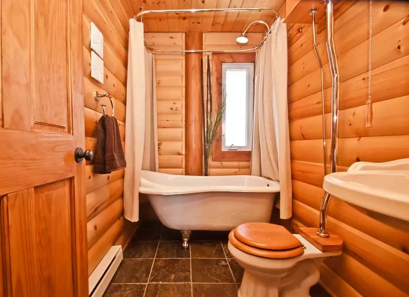 Ванна кімната в дерев'яному будинку (97 фото): дизайн і обробка душової в будинку з бруса, цікаві рішення для інтер'єру, варіанти облаштування 10138_33