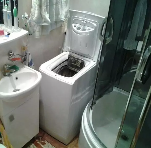 बाथरूम में वॉशिंग मशीन (101 फोटो): आधुनिक और अन्य शैलियों में वॉशिंग मशीन के साथ बाथरूम के इंटीरियर की आंतरिक डिजाइन विशेषताएं 10413_17