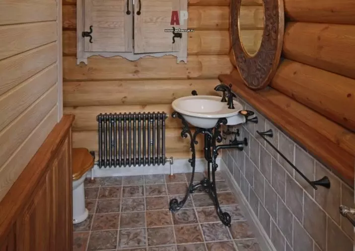 Kamar mandi di rumah kayu (76 foto): Desain kamar di rumah bar di negara ini, contoh lantai selesai, skema ventilasi 10475_72