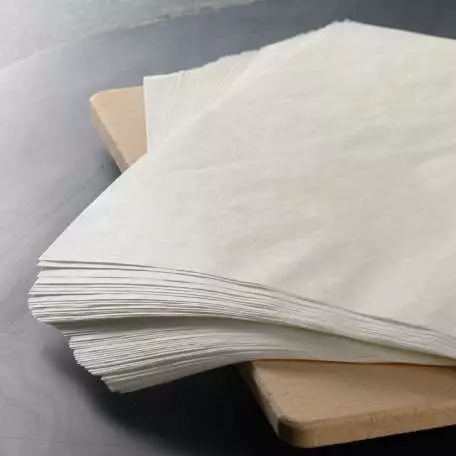 Sütőpapír: pergamenpapír sütéshez és szilikonozott. Hogyan cserélje ki a sütőben? Hogyan kell használni? 11011_2