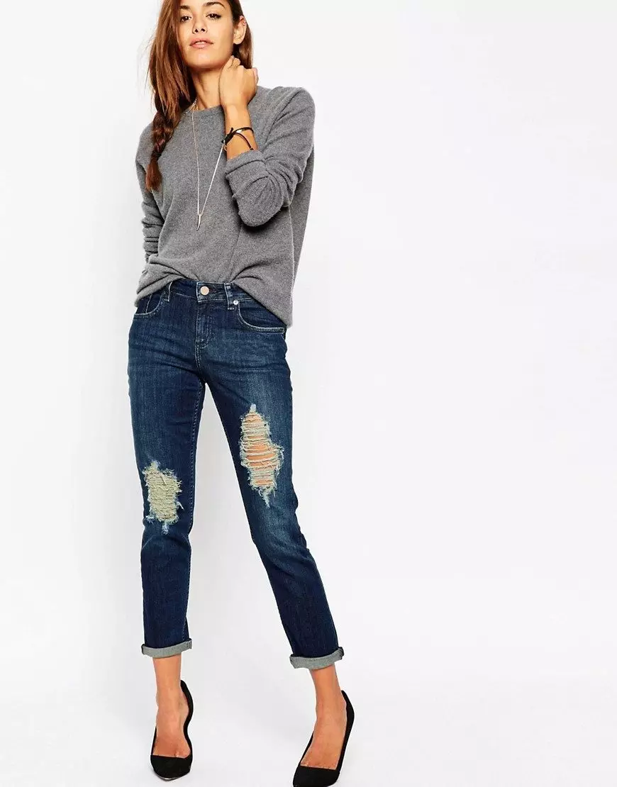 Geruk kêrel jeans (40 foto's): Wat 'n gaten kêrel jeans met gate dra 1127_19