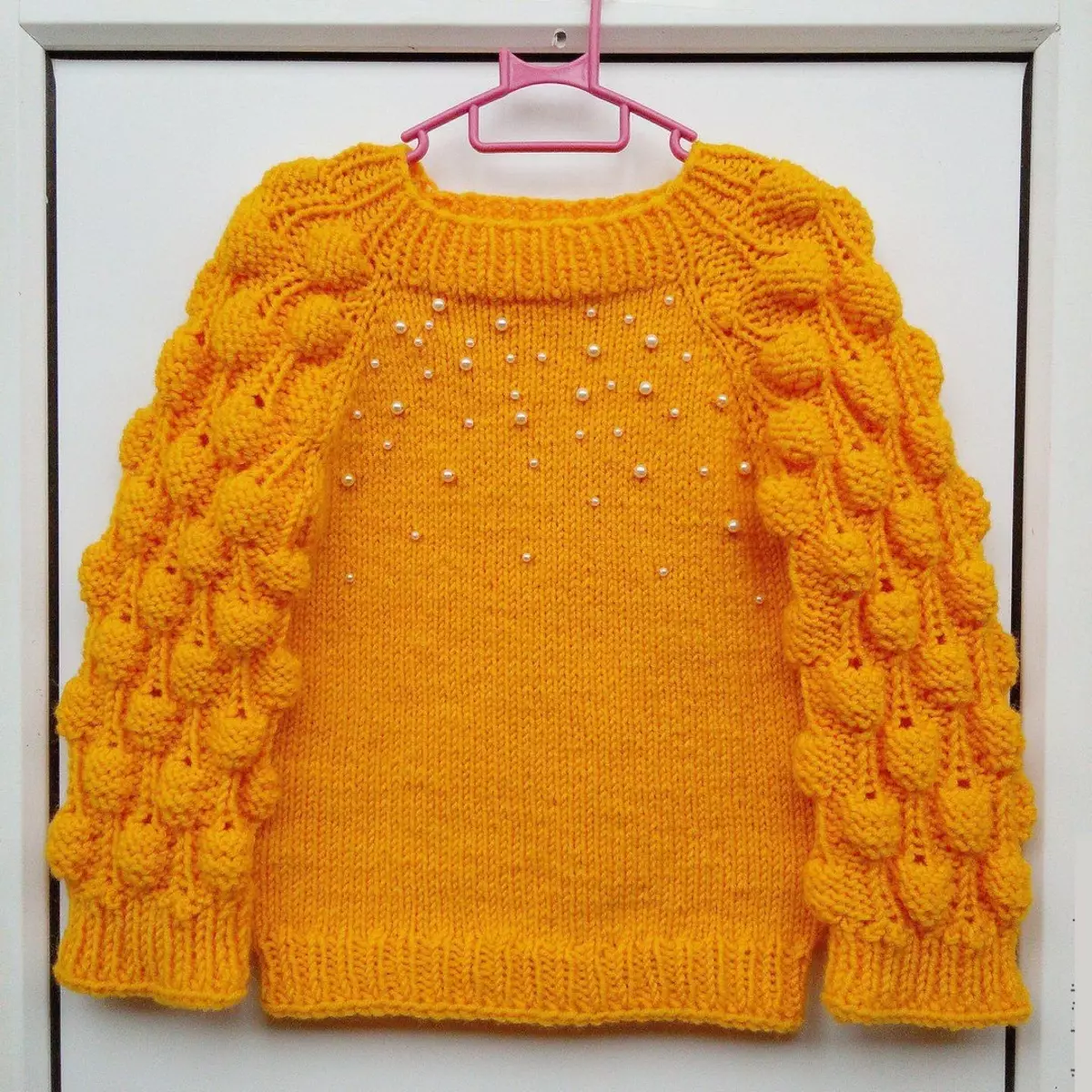 女の子のためのセーター（111写真）：子供のウールモデル：9歳までの女の子とティーンエイジャー、学校の喉の下でトレンディー 13526_93