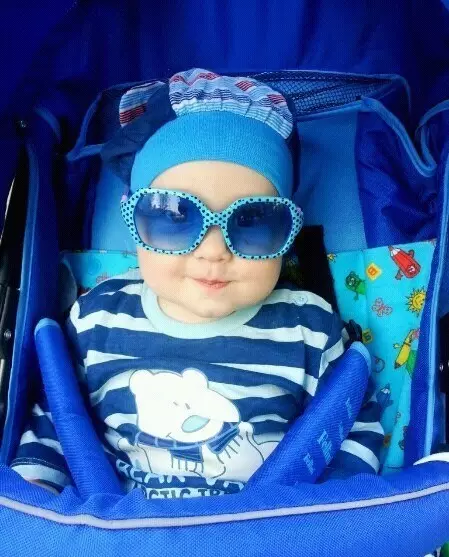 Óculos de sol bebés (73 fotos): Óculos de sol na moda Crianças reais, modelos para crianças, proteção solar confiável 13566_36