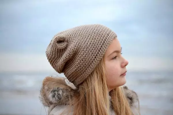Плетене капице за девојчице (91 фотографија): за адолесценте 12-14 година и новорођена девојка са ушима, топли шешир-усханка 13615_47