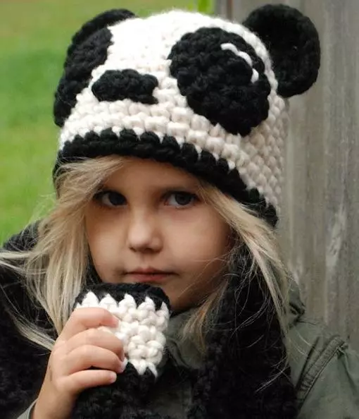 Плетене капице за девојчице (91 фотографија): за адолесценте 12-14 година и новорођена девојка са ушима, топли шешир-усханка 13615_69