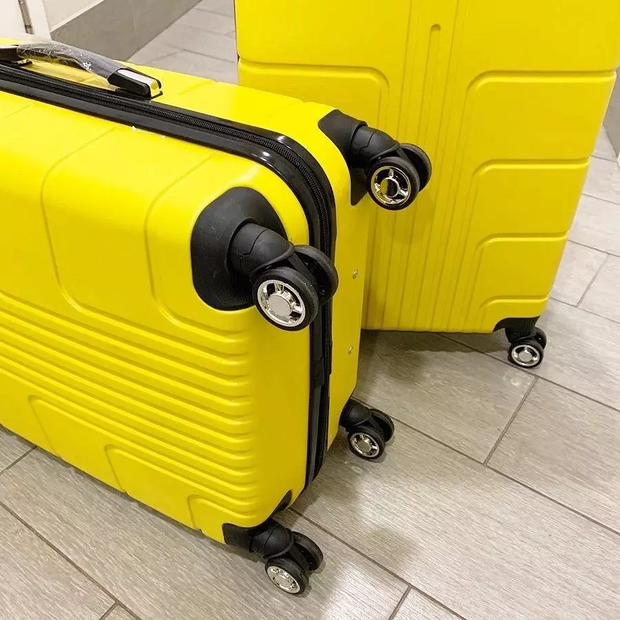Polycarbonate suitcases: ماددىي ئالاھىدىلىكى. قانداق تاللاش - polypropylene, ABS سۇلياۋ ياكى polycarbonate? ئوبزورلار 13625_8