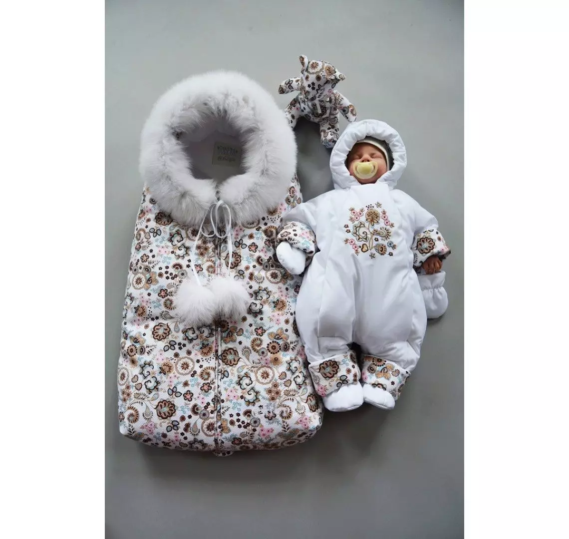 لباس های زمستانی برای نوزادان (69 عکس): لباس ترانسفورماتور، پاییز زمستان، بر روی پوست گوسفند، از کری، بر روی عصاره، چگونه انتخاب کنید 13634_32