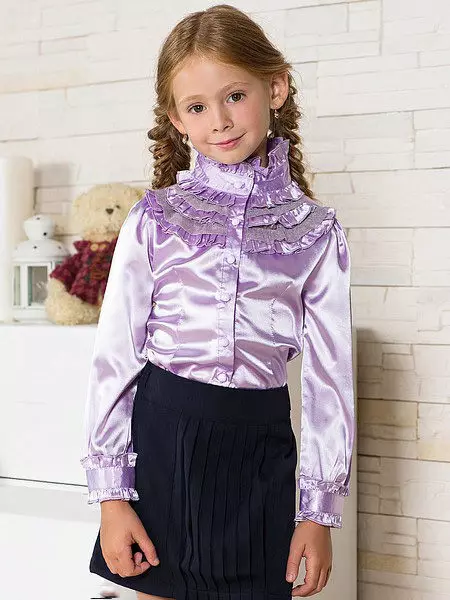 Camicette per ragazze (61 foto): modelli eleganti e giovanili per bambini, camicette alla moda 2021 13682_17