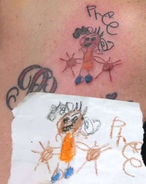 Tattoo vatsaan tyttöjen (61 valokuvaa): luonnokset. Tatuoinnit vatsan alareunassa ja navan ympärillä synnytyksen jälkeen, pieni kaunis tatuointi ja iso 13772_35