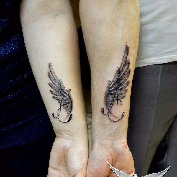 纹身“天使翅膀”（42张照片）：女孩和男人的纹身值，天使翅膀在他的背部，手和颈部 13819_37