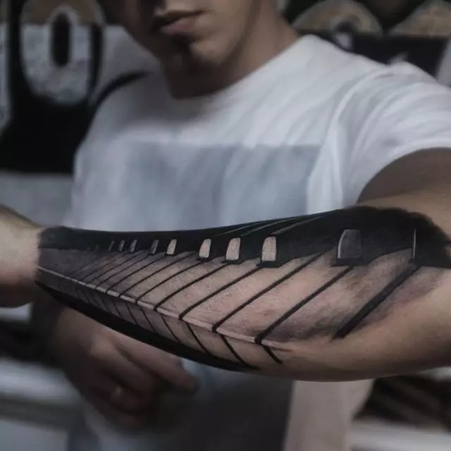 Тетоважа поврзана со музика: скици на музички тетоважи. Тетоважа на рака и на вратот, мали и големи. Тетоважи за мажи и девојки 13868_24
