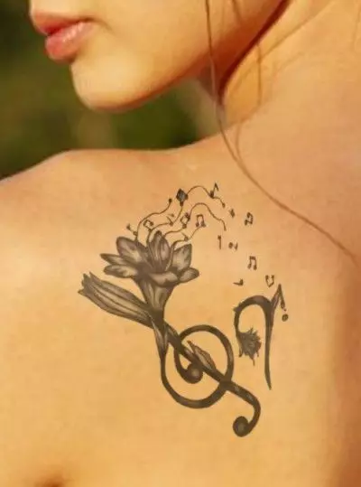 Tatuaż związany z muzyką: szkice tatuaży muzycznych. Tatuaż pod ręką i na szyi, mały i duży. Tatuaże dla mężczyzn i dziewcząt 13868_43