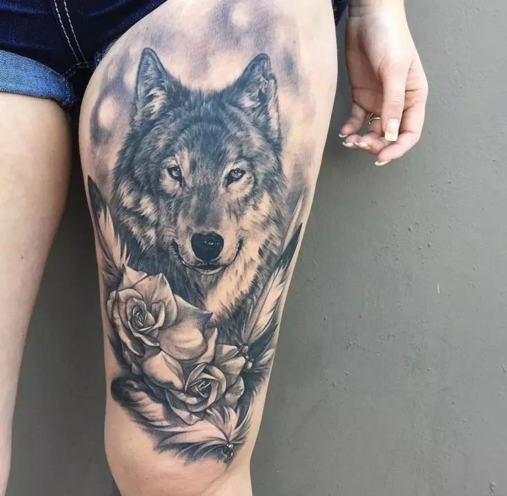 紋身“狼”為一個女孩：手上和腿上的紋身的意思和素描。在手腕，臀部和肩膀的美麗的女性紋身花刺。狼軌道和其他紋身 13965_41