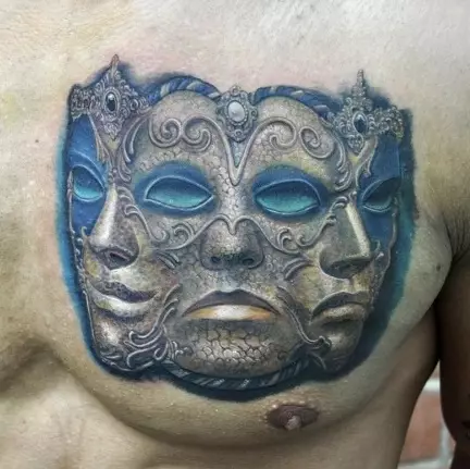 Тату «Театральні маски»: значення і ескізи татуювань для чоловіків і жінок, красиві приклади тату з масками, що символізують комедію і трагедію 13970_6