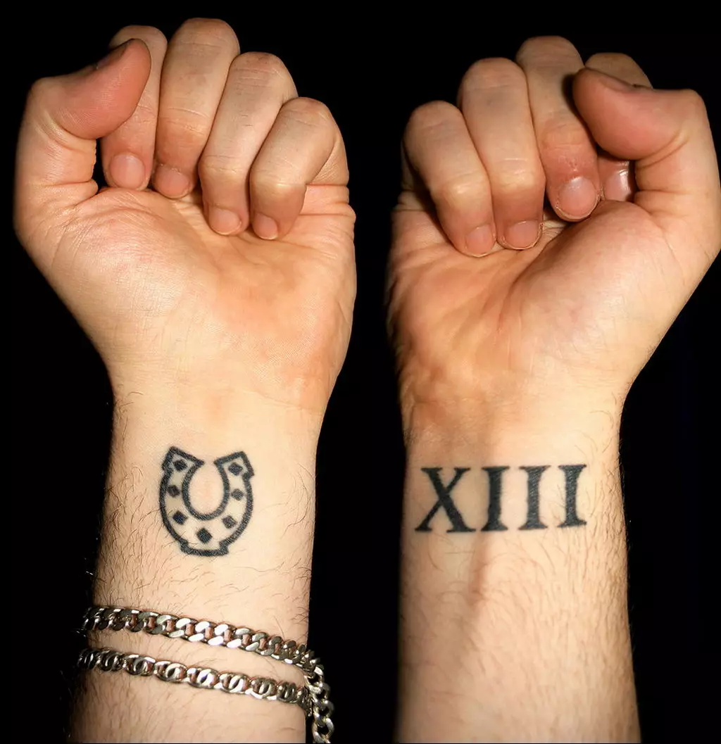 Tattoo with digit 13: value and sketches. What does the number on the neck and on the hand, in other parts of the body for men and girls? 13972_28
