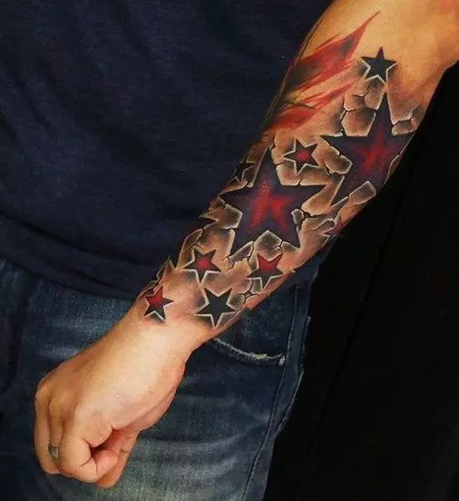 Tattoo cu stele (76 fotografii): Valoarea tatuajelor. Tatuaj pe mâna lui pe încheietura mâinii și pe deget, pe piept și pe alte părți ale corpului printre fete și bărbați. Cinci stele și altele 13977_6