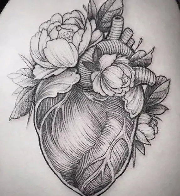 Un tatuaje en forma de corazón (41 fotos): bocetos de tatuajes y significado. Tatuaje en la muñeca a mano y en otras partes del cuerpo. Pequeño corazón roto y otras opciones. 14022_25