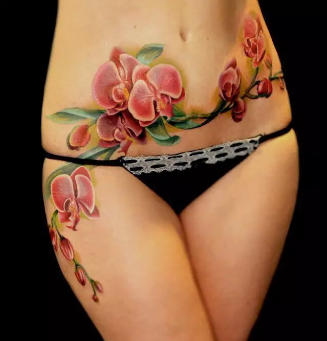 Tattoo z orhidejami (57 fotografij): tattoo vrednost za dekleta, skica pregled. Tattoo na roki in nogi, na ključnico in na hrbtu, na rami in na drugih delih telesa 14034_48