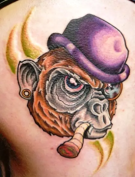 Tetoválás majmokkal: a tetoválás értéke, tetoválás a köldökön és a hasán, a kézben és a mellkason, példák a vázlatokra, a férfiakra és a nőkre 14056_5