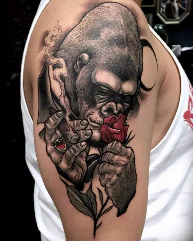 Tato dengan monyet: nilai tato, tato di pusar dan perut, di tangan dan di dada, contoh sketsa, tato untuk pria dan wanita 14056_52