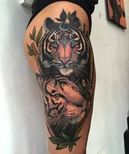 Tattoo ar tīģeri meitenēm (34 fotogrāfijas): nozīme un skices. Tattoo Tiger pie rokas un augšstilbā, uz kājas un uz muguras, uz plaukstas un uz pleca 14119_27