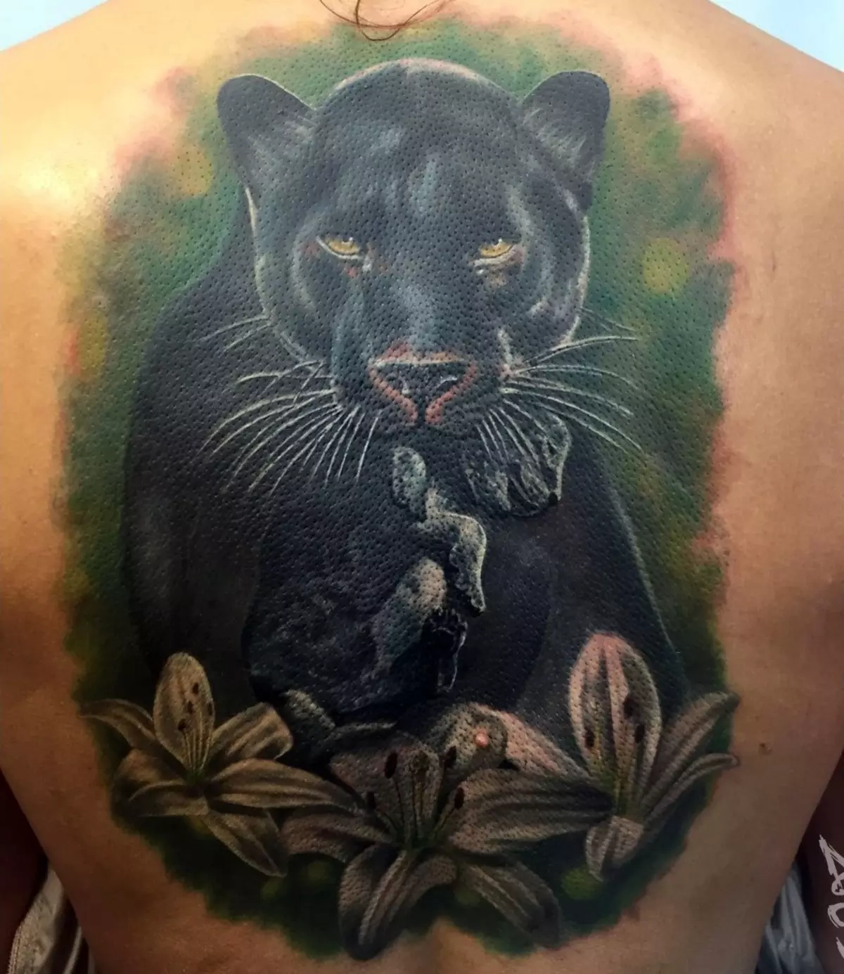 TattoO ma le Puma: O le taua ma ata o tato mo teine ​​ma tagata, tattoo i luga o le tauau ma luga o le ufiufi 14136_34