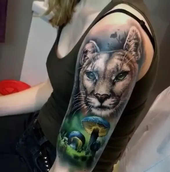 Tattoo tare da Puma: Darajar da zane-zane da kuma maza, tattoo a hannu da kan kafada, a kan wuya da sauran yankuna 14136_35