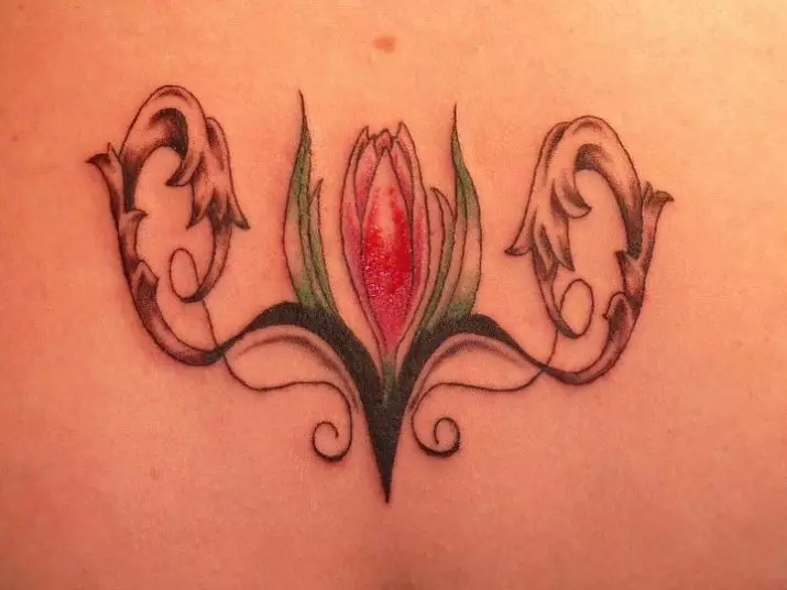 Tato dengan tulip: nilai tato untuk anak perempuan dan untuk pria, sketsa. Tato di tangan pergelangan tangan dan di daerah lain, tulip hitam dan opsi lainnya 14192_24