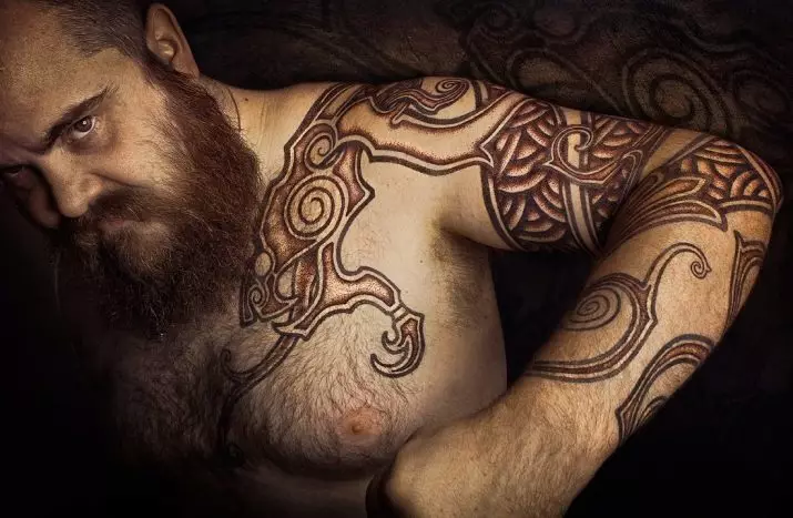 Tattoo Vikings (55 Fotoen): Viking Tattooen Wäert. Tattoo op d'Schëller, Ärmelen op Hänn fir Männer an Tattoo op der Ënneraarm, op der Récksäiten 14249_2