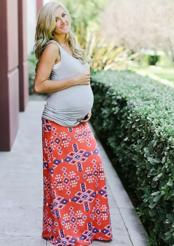 妊娠中の女性のためのスカート（48写真）：床と短い、鉛筆、砂の上の長さ、ゴムバンドの上に長い 14643_23