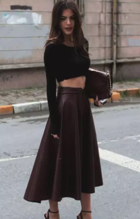 Burgundy leather skirt sun with crop top.