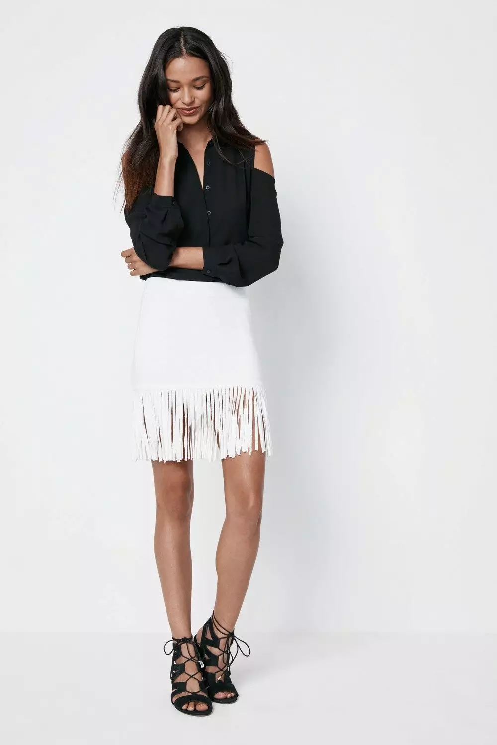 Mini white skirt with fringe