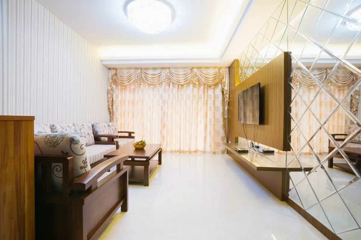 Living Rooms (191 Photos): Magagandang panloob na mga pagpipilian sa disenyo, eksklusibong designer na disenyo ng mga living room, mga ideya at mga tip sa pag-aayos 2021. Mga naka-istilong pagpipilian at mga tampok ng palamuti ng pagpasa lounge 147_35