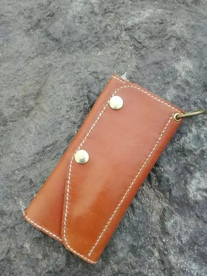 Maoko Wallets (62 photos): Leather motesheni, chikwama chevakadzi chakagadzirwa nehombodo yechokwadi 15134_17