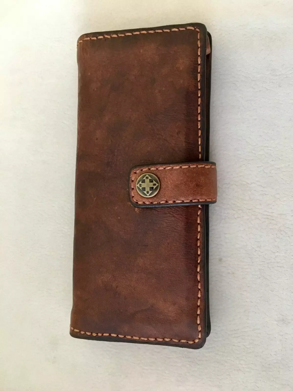 Handmade wallets (62 mga larawan): Mga purse ng katad, wallet ng kababaihan na gawa sa tunay na katad 15134_61