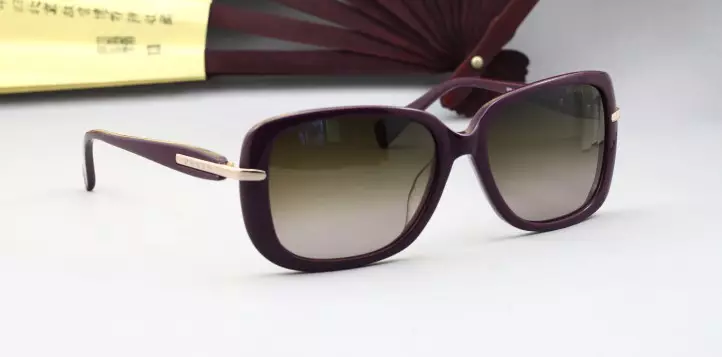 Prada Sunglasses (54 zdjęcia): Opinie na temat okularów przeciwsłonecznych kobiet ze słynnej marki 15185_42