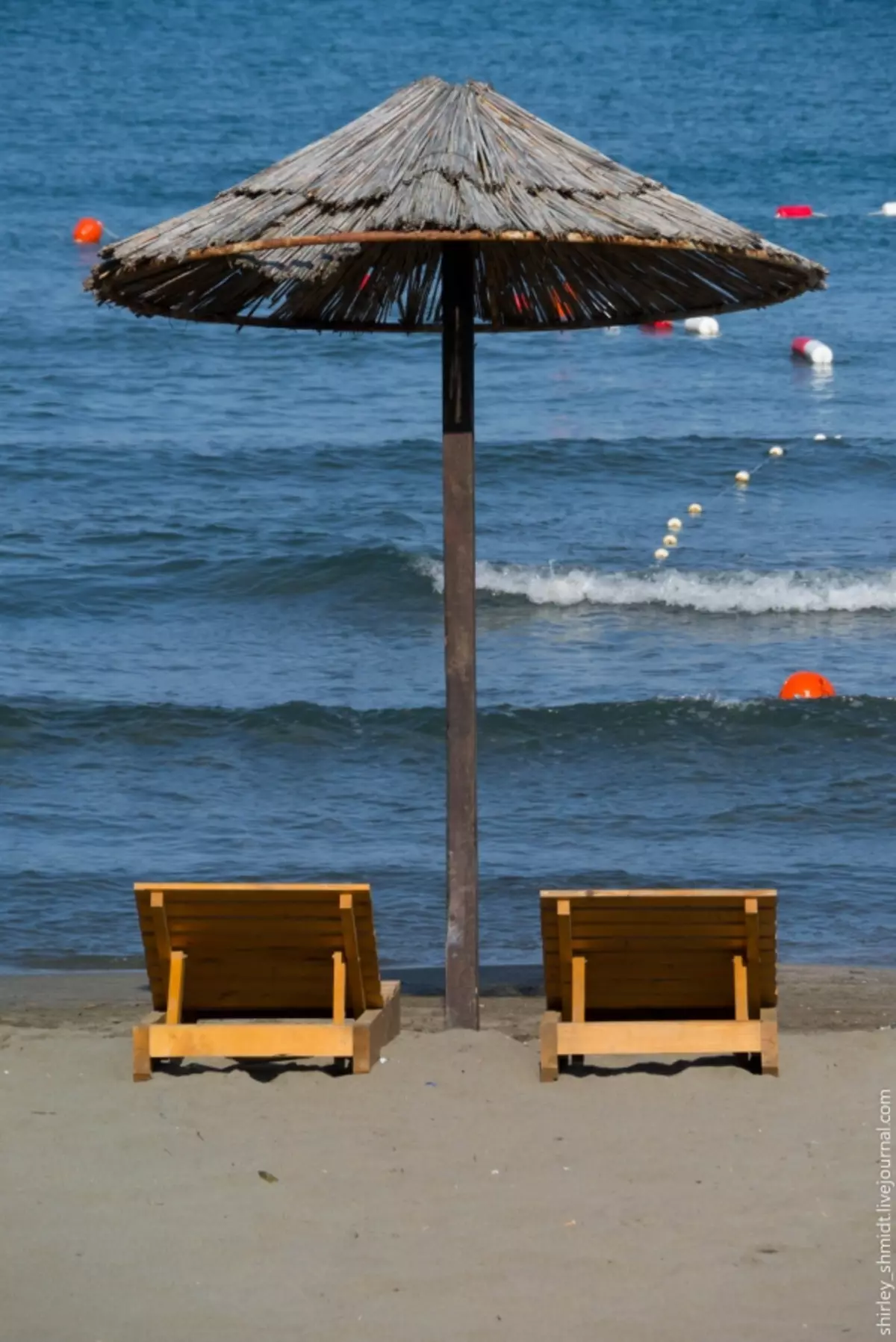 Strân Ubrella (61 foto's): Summer foldje gruttere dyk en hânmodellen út 'e sinne foar it strân, lykas se wurde neamd 15244_40