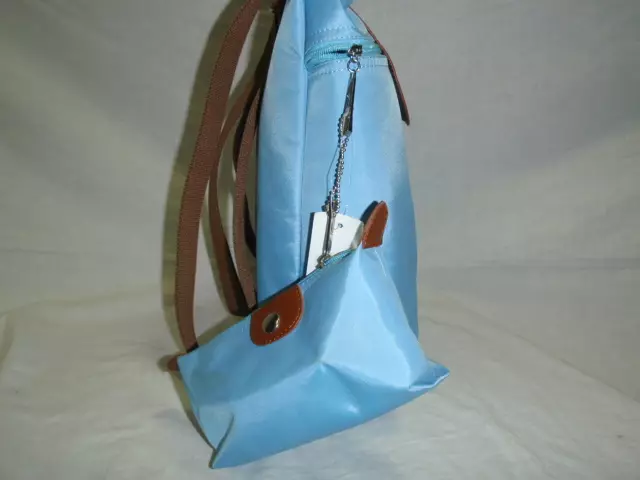 Road Cosmetic Bag (67 mga larawan): Female Folding Models para sa Travel, Stylish Cosmetics For Women 15251_32