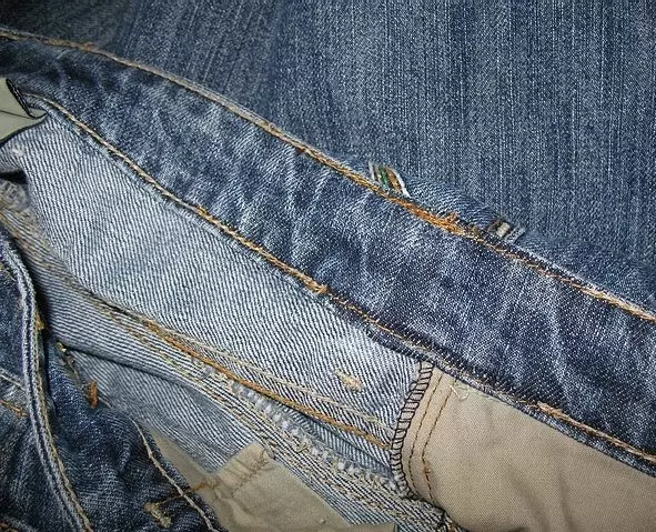 Bagaimana untuk menjahit seluar jeans di pinggang atau membuat saiz yang kurang: bagaimana untuk mengurangkan dalam pinggul 15584_40