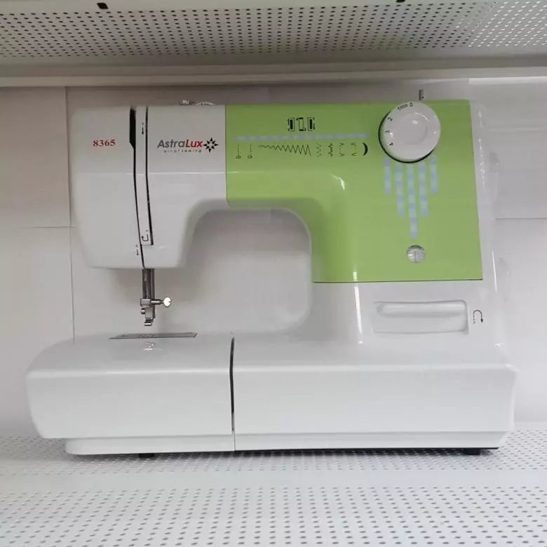 máquinas de coser: AstraLux modelo con un filamentaker, automóviles 150, línea roja Victoria y otros. instrucciones de revisión y opinión 15681_13