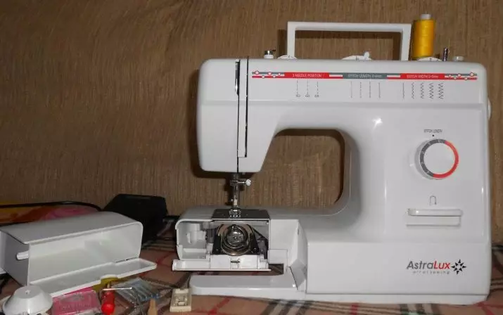 máquinas de coser: AstraLux modelo con un filamentaker, automóviles 150, línea roja Victoria y otros. instrucciones de revisión y opinión 15681_17