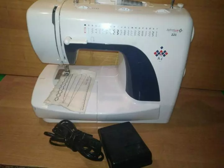 máquinas de coser: AstraLux modelo con un filamentaker, automóviles 150, línea roja Victoria y otros. instrucciones de revisión y opinión 15681_37
