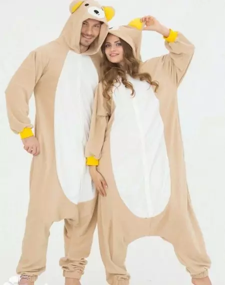 Pyjamas för tjejer (68 bilder): gul, rolig och rolig, i form av en kanin, batman, tvättbjörn, trendig 2021, pyjamas, för en tonåring 1613_37