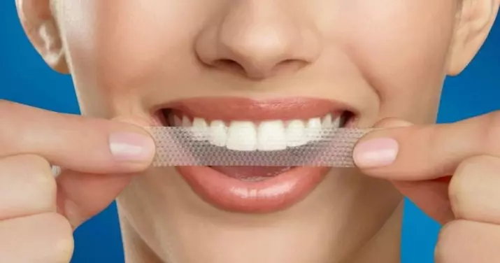 Whitening nauhat hampaiden maailmanlaajuinen valkoinen: aktiivisen hapen ja hiilen valkaisua varten. Suosituksia käytettäväksi. Arvostelut 16149_12