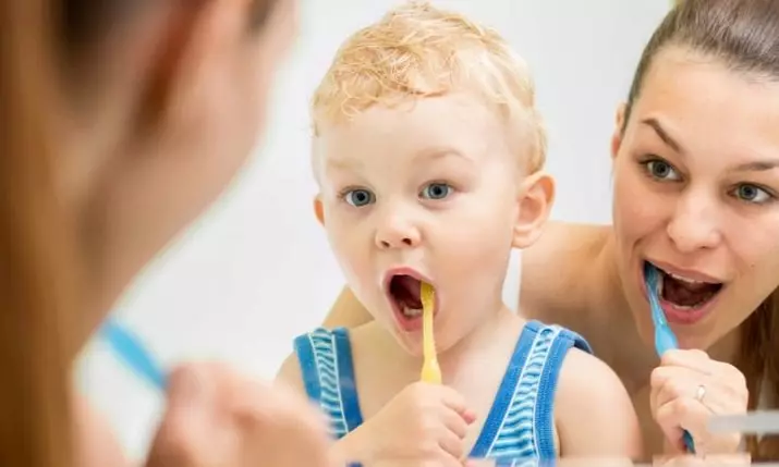 როგორ ასწავლეთ ბავშვს კბილების გატეხება? როგორ ასწავლეთ დახმარების გაწევის კალენდარი და ბავშვთა ტაიმერი 2-3 წლის განმავლობაში? სწავლის ჰიგიენა თუ მას არ სურს 16153_11