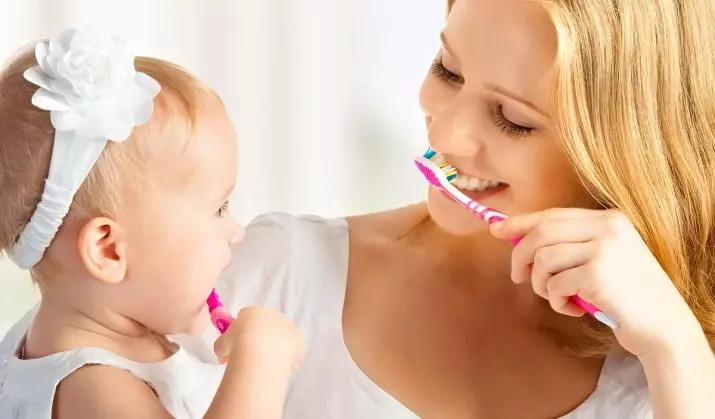 Hoe een kind te leren om je tanden te poetsen? Hoe het te leren met de hulp van een schoonmaakkalender en kindertijd in 2-3 jaar? Hygiëne leren als hij niet wil 16153_20