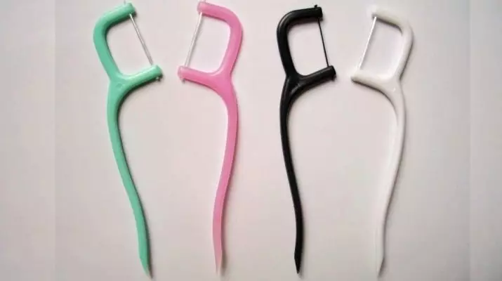 Toothpicks kanthi benang: Cara milih floss kanggo untu? Cara nggunakake benang dental ing tongkat plastik? 16188_13