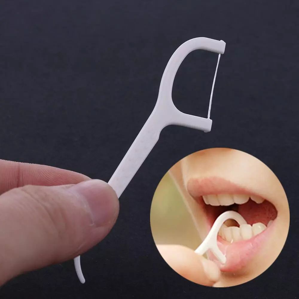 Zahnstochern mit Gewinde: wie eine Zahnseide für die Zähne wählen? Wie ein Zahngewinde auf einem Plastikstab benutzen? 16188_5