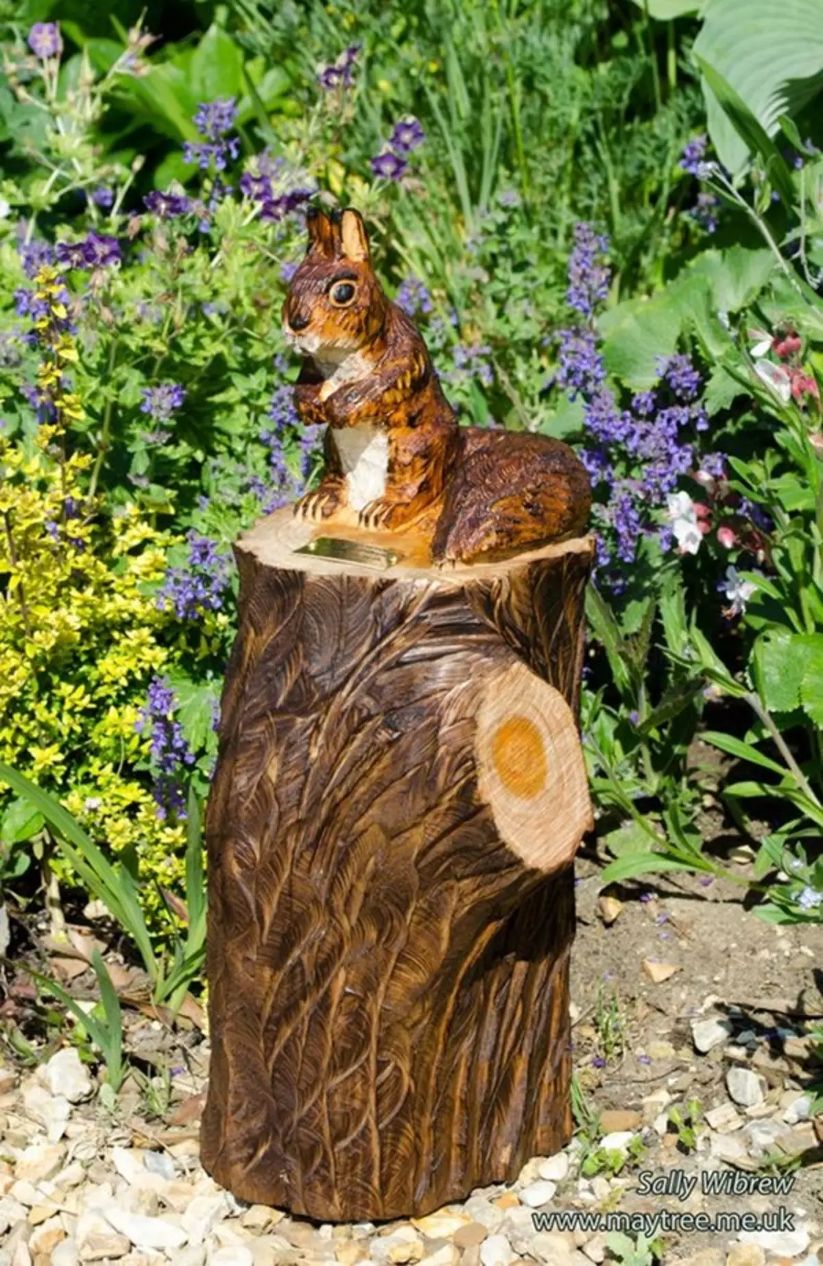 Kettingzaag houtsnijwerk: houten sculpturen voor beginners. Hoe de pilage van de beer en andere grote sculpturen, een eekhoorn en paddestoel te laten knippen? 19208_21