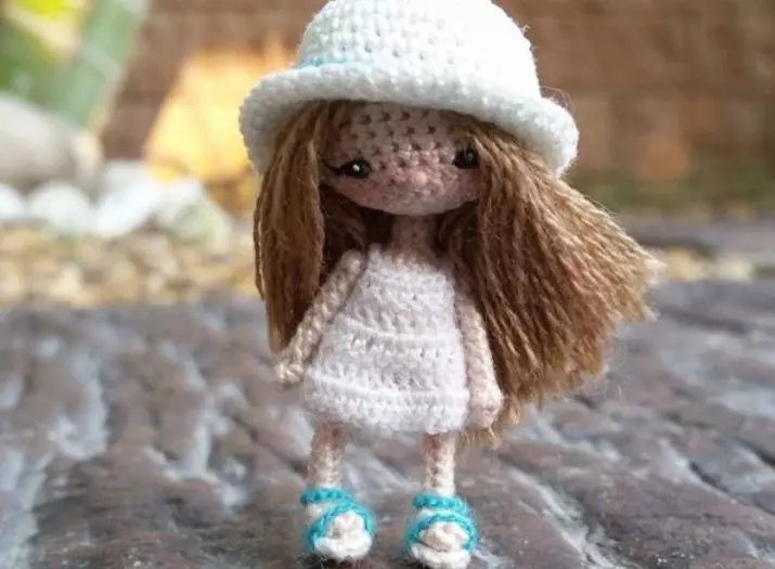 Dolls de Amigurum (49 fotos): Descrición e esquemas de crochê, características de marco de xoguetes de punto, clases maxistrais paso a paso 19348_39